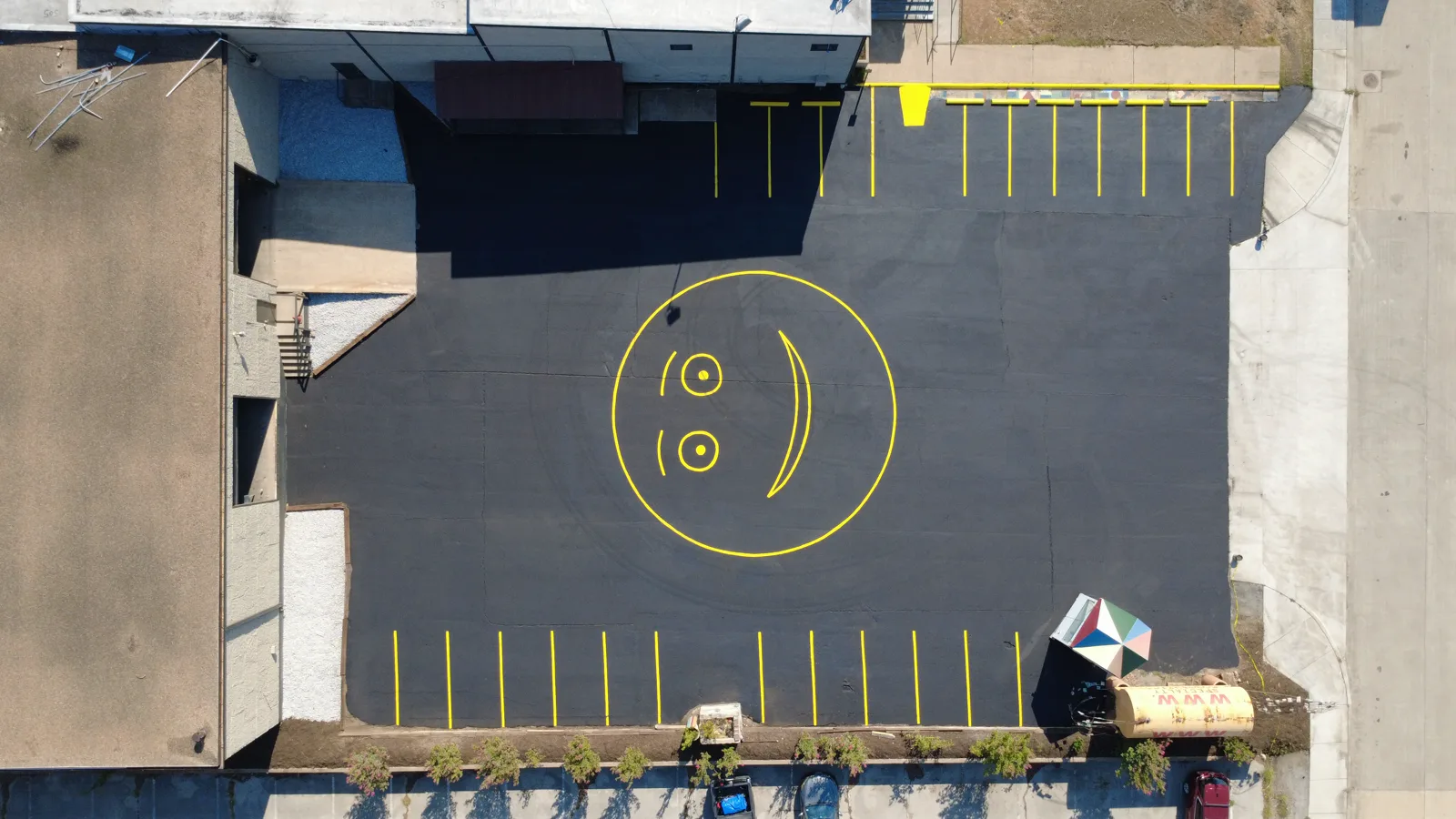 Top-down Arlington industrial property parking and exterior detail captured by drone